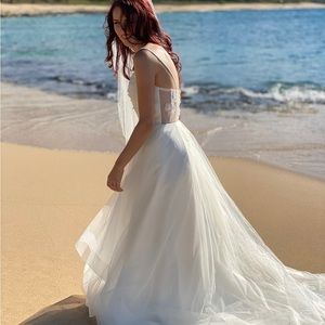 David's Bridal wedding dress and veil. $200 OBO Had professionally cleaned